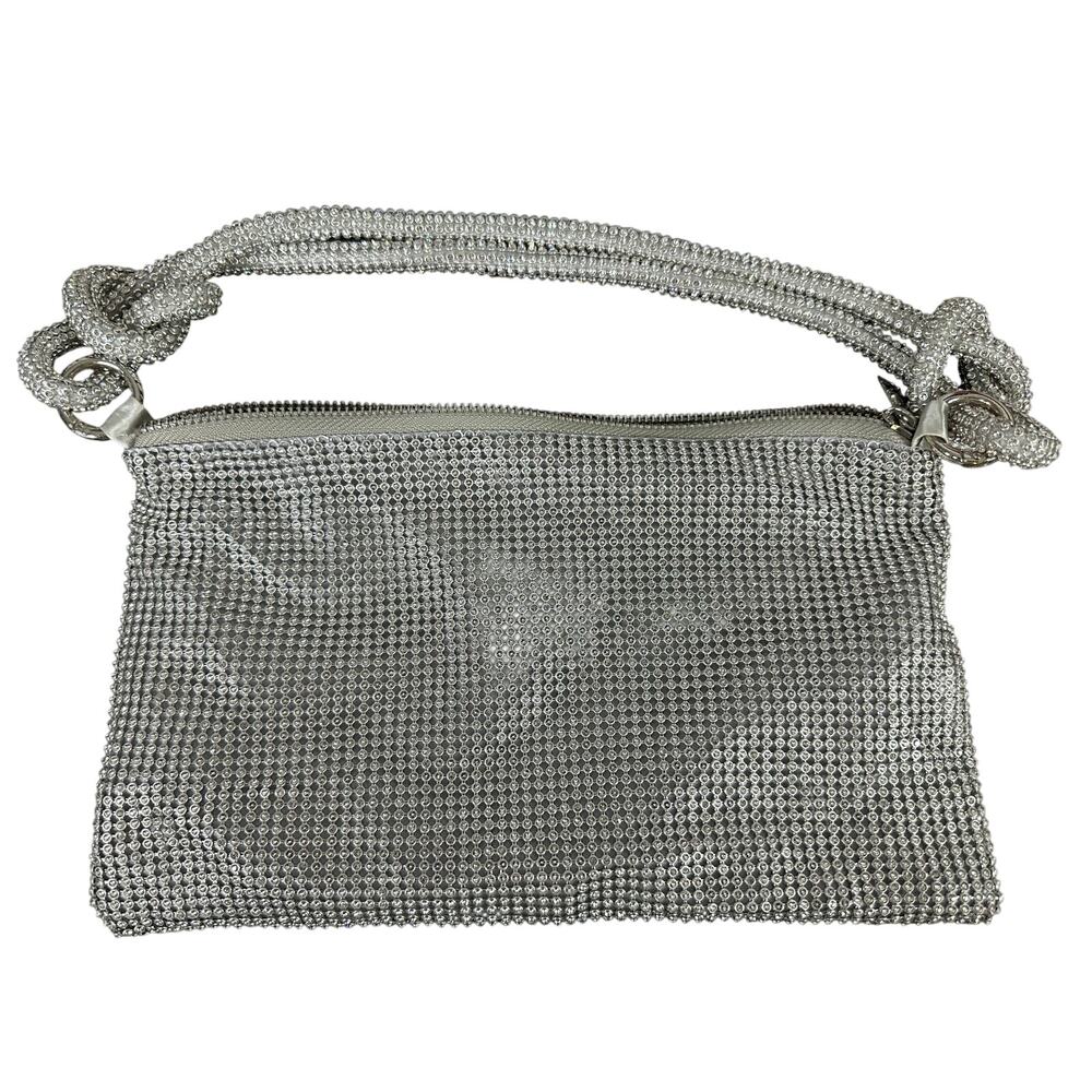 silver rhinestone evening bag with a knotted handle